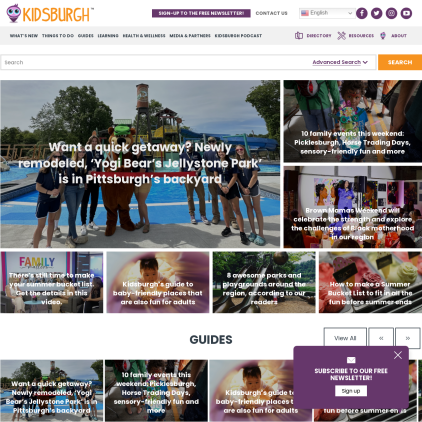 A detailed screenshot showcasing the homepage of kidsburgh.org, highlighting its main features and design elements.