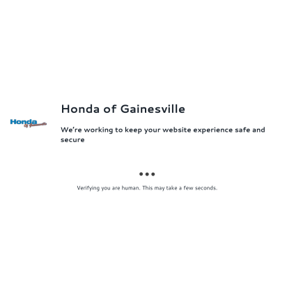 A detailed screenshot showcasing the homepage of www.hondaofgainesville.com, highlighting its main features and design elements.